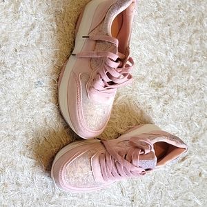 Pink sparkle sneakers.